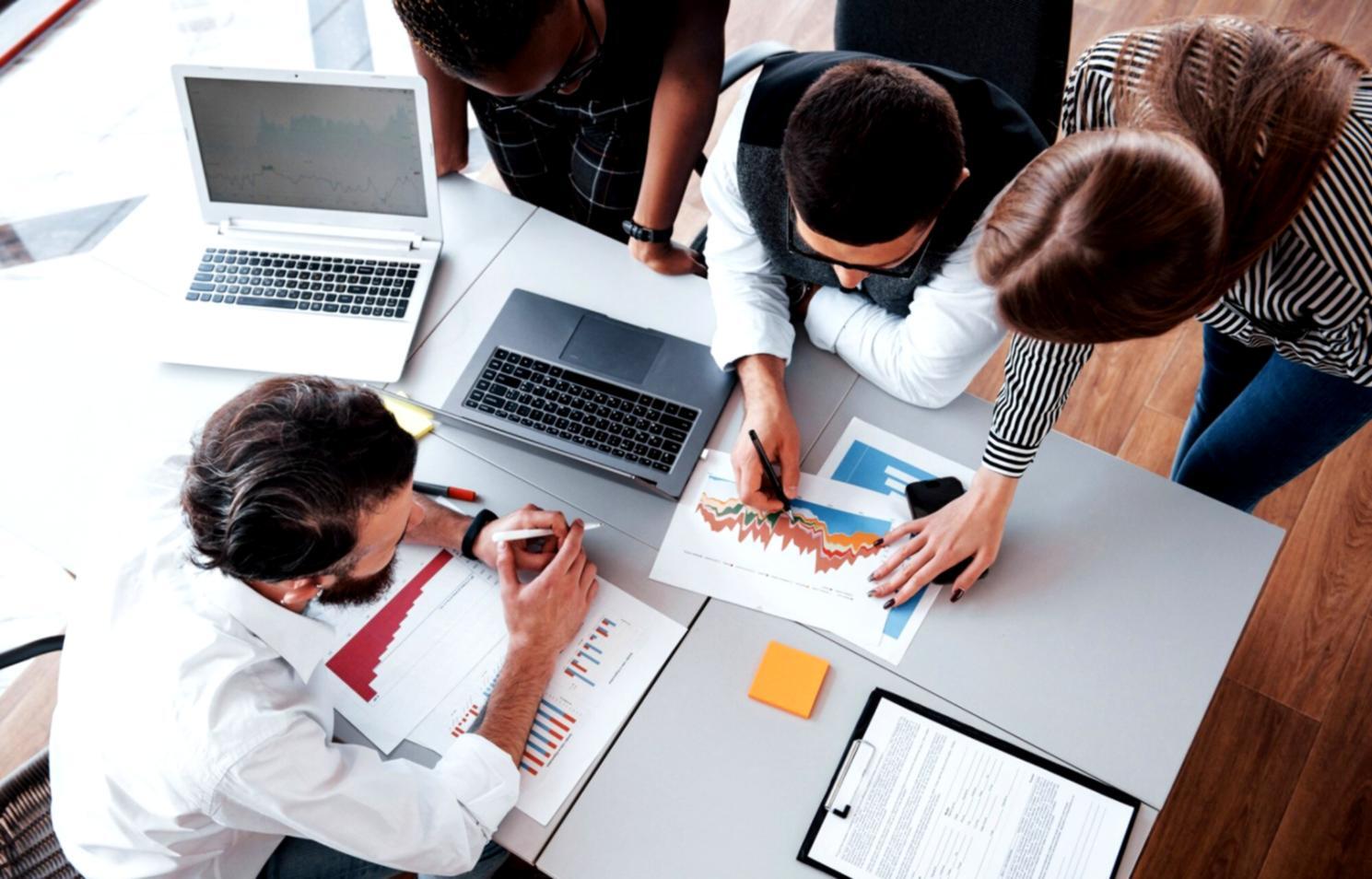 Professional financial workspace with budget reports and analysis tools